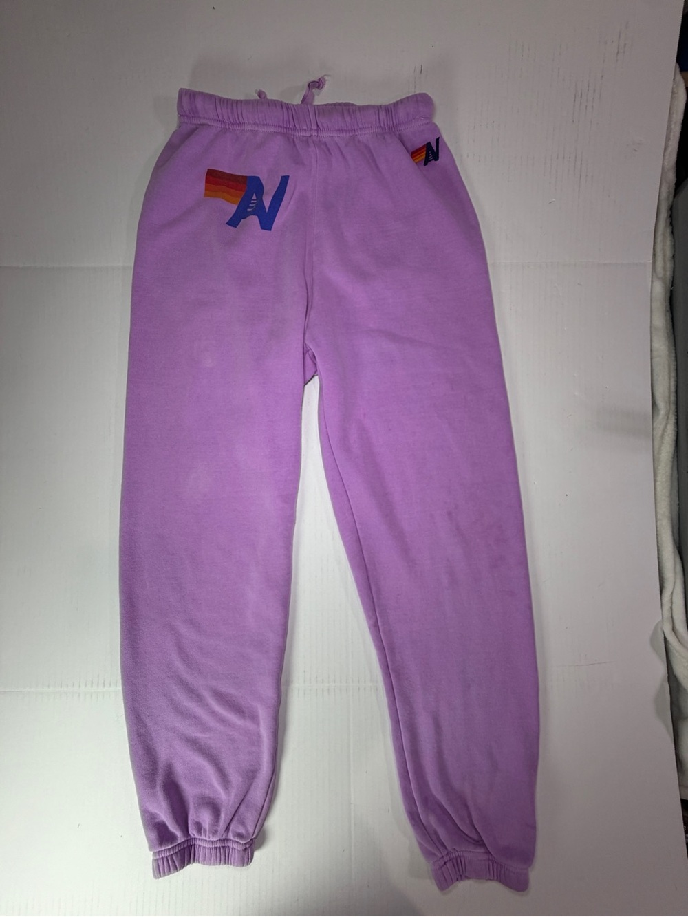 Aviator Nation Lilac Track Joggers with Rainbow 'N' Logo distressed